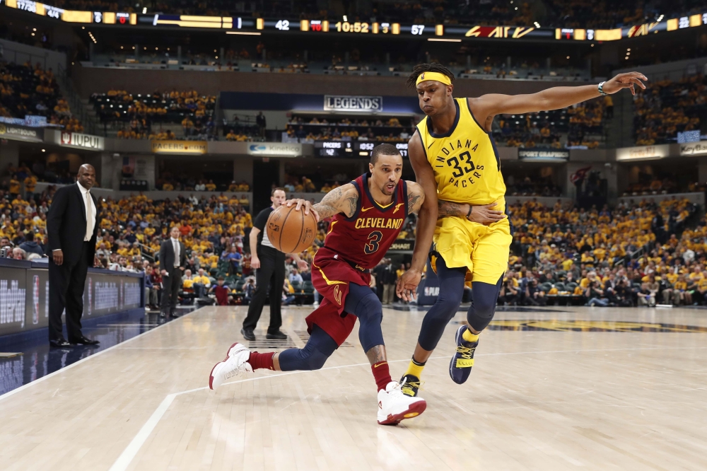 Cleveland Cavaliers guard George Hill (3) drives to the basket against Indiana Pacers center Myles Turner (33) during the third quarter in game three of the first round of the 2018 NBA Playoffs at Bankers Life Fieldhouse. Brian Spurlock
