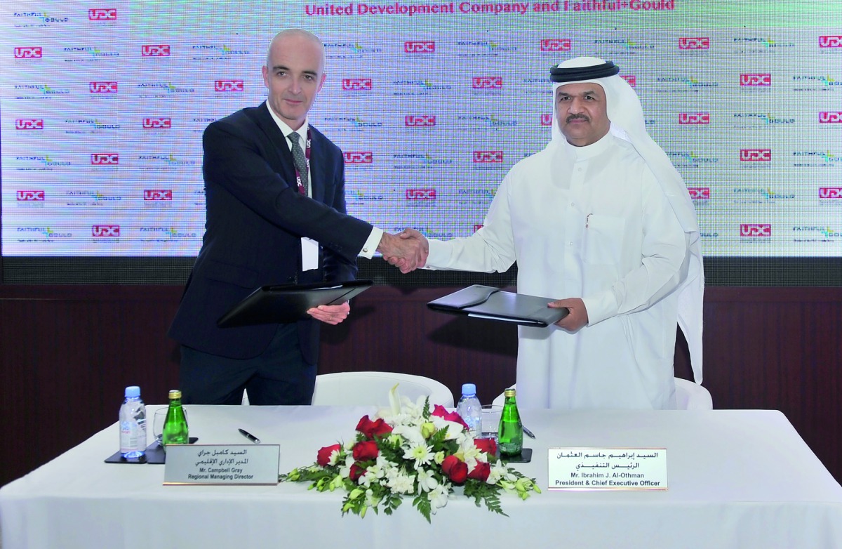 Campbell Gray (left), Regional Managing Director of Faithful Gould, and Ibrahim Jassim Al Othman, President and CEO of UDC, at the signing event, yesterday. Pic: Baher Amin / The Peninsula