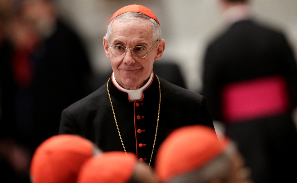 FILE PHOTO: French Cardinal Jean-Louis Tauran arrives to attend a prayer at Saint Peter's Basilica in the Vatican March 6, 2013. REUTERS/Max Rossi