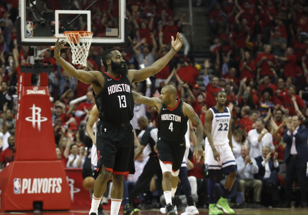 James Harden #13 of the Houston Rockets reacts in the second half during Game Five of the first round of the 2018 NBA Playoffs against the Minnesota Timberwolves at Toyota Center on April 25, 2018 in Houston, Texas.Tim Warner/AFP 
