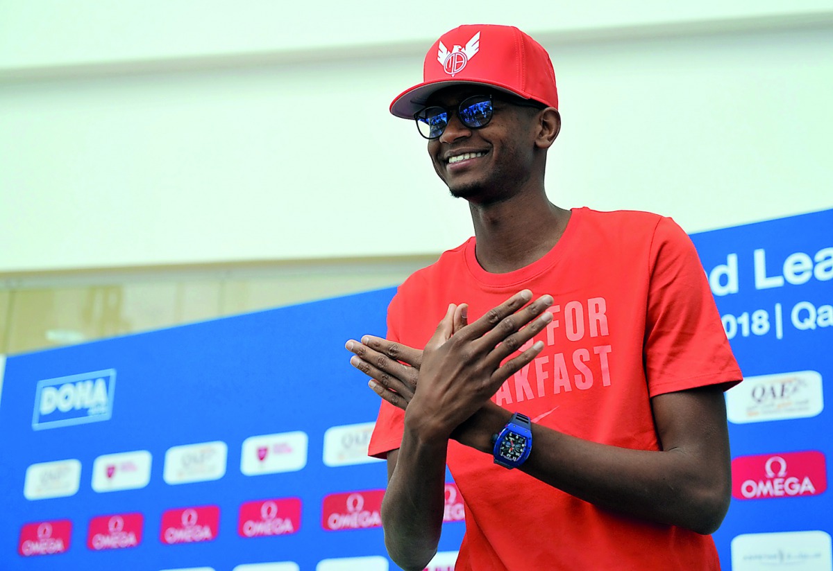 Qatar’s Mutaz Essa Barshim makes his signature pose during a press conference held in Doha yesterday. Picture by: Salim Matramkot/The Peninsula