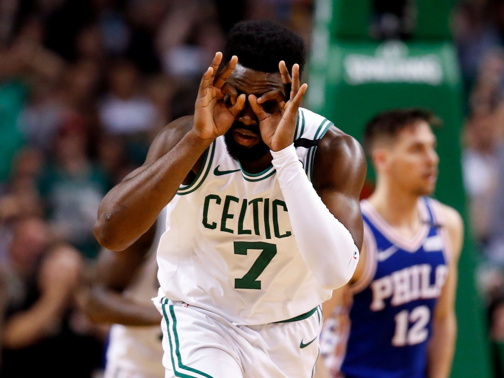 Boston Celtics guard Jaylen Brown (7) reacts after scoring against the Philadelphia 76ers during the second half in game five of the second round of the 2018 NBA Playoffs at the TD Garden.Greg M. Cooper
