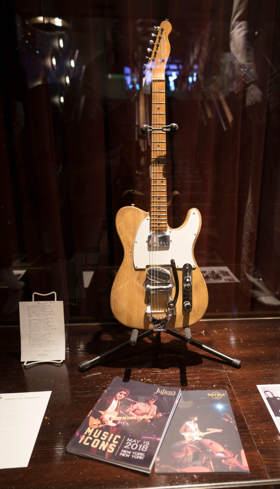 A Bob Dylan/Robbie Robertson 1965 Fender Telecaster guitar is displayed along with other items during a media preview May 14, 2018 in New York. AFP / Don EMMERT