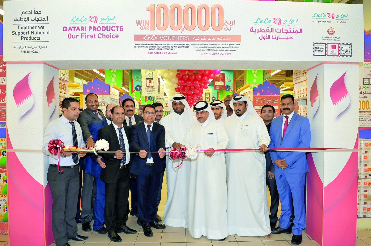 Abdullah Al Kuwari, Director of Supply Department at the Ministry of Economy and Commerce, inaugurating the initiative “Qatari Products Our First Choice” at the Al Gharafa branch of Lulu Hypermarket in Doha yesterday, as Shanavas PM, Regional Manager, Lul