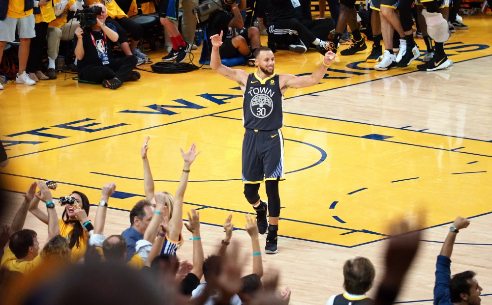 Golden State Warriors guard Stephen Curry (30) reacts following the 122-103 victory against the Cleveland Cavaliers in game two of the 2018 NBA Finals at Oracle Arena. Mandatory Credit: Kelley L Cox-USA TODAY Sports