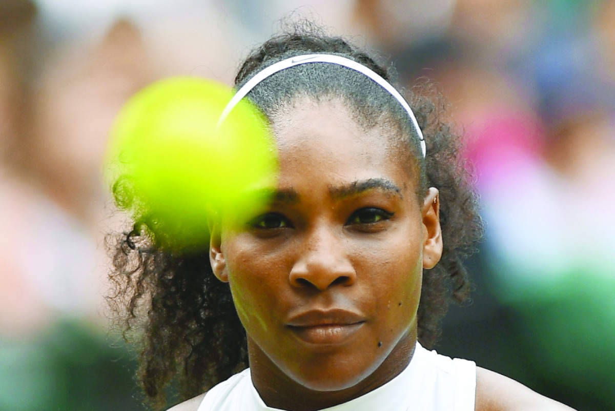 US player Serena Williams celebrates after winning the women’s third round match Roland Garros 2016 French Tennis Open in Paris on May 28, 2016. AFP / Miguel Medina