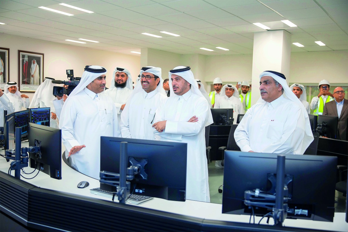 Prime Minister and Interior Minister H E Sheikh Abdullah bin Nasser bin Khalifa Al Thani touring the control room of the mega reservoirs project and pumping stations in the Umm Salal area, yesterday. Also seen are the Minister of Energy and Industry H E D