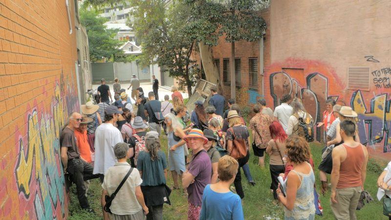 Members of Urban Coup tour the site of their planned co-housing project in Melbourne, Australia. Thomson Reuters Foundation/ Urban Coup