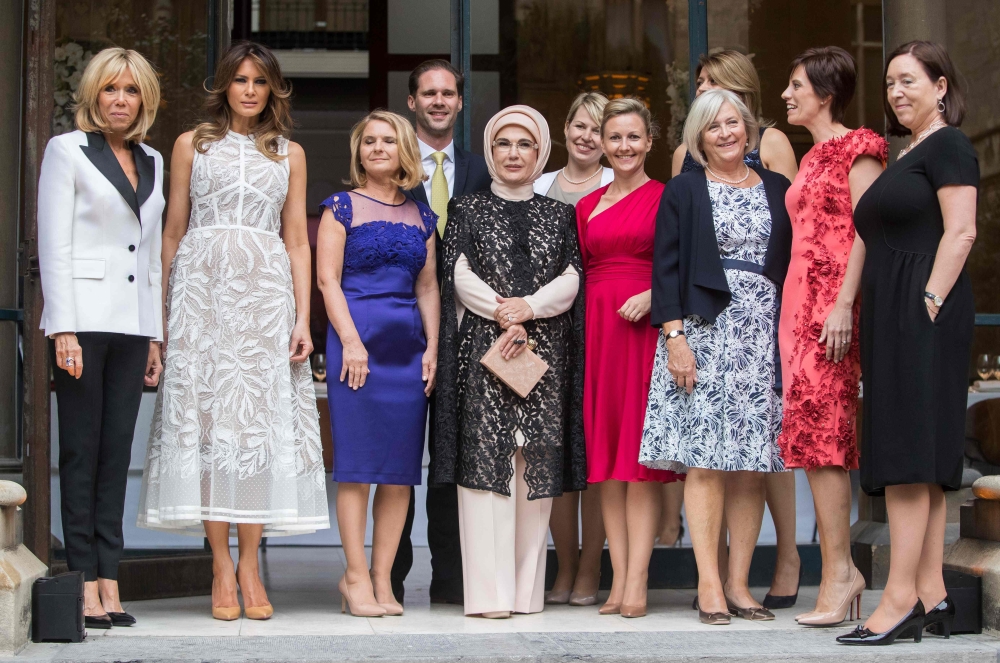 
French First lady Brigitte Macron, US First Lady Melania Trump, Malgorzata Tusk, Husband of Luxembourg's pime minister Gauthier Destenay, First Lady of Turkey Emine Gulbaran Erdogan, Partner of Estonia's Prime Minister Karin Ratas, Partner of Slovenia's