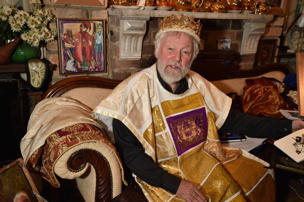 Paul Delprat, 76, posing for a photo at his home as the self-appointed Prince of the Principality of Wy, a micronation spanning his home in the north Sydney suburb of Mosman. AFP / Peter Parks