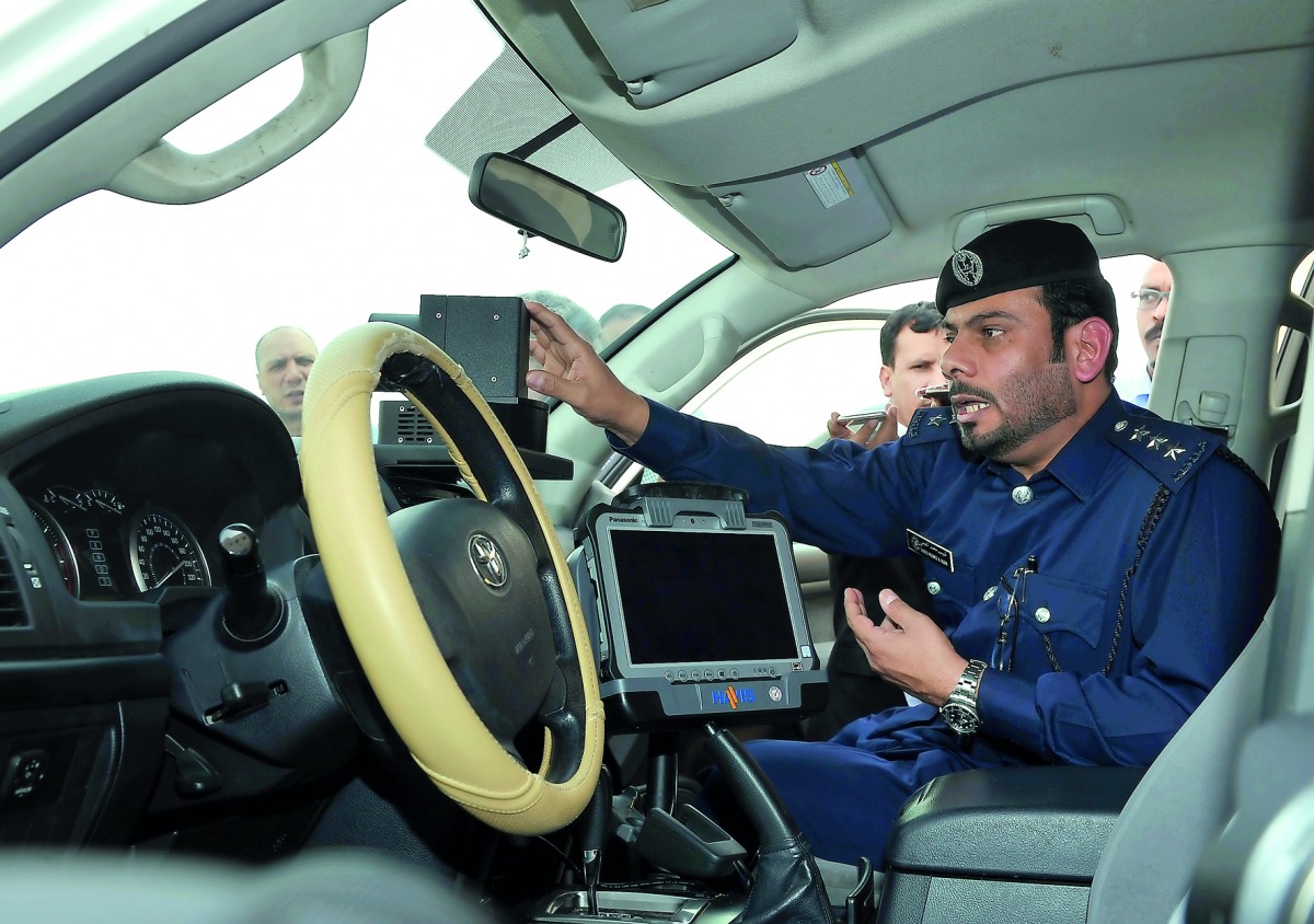 Captain Shabib Mohammed Al Nuaimi from the Traffic Patrols introducing the new civil patrol equipped with a modern radar device.  Pic:Salim Matramkot/The Peninsula.
