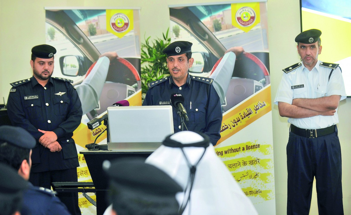 FROM LEFT: Capt. Khalid Mubarak Al Khulaifi, Head of Traffic at Dukhan; Colonel Muhammad Radi Al Hajiri, Director of Traffic Awareness Department, and Major Jaber Mohamed Rashid Odaiba, Assistant Director of Media and Awareness, during a press conference 