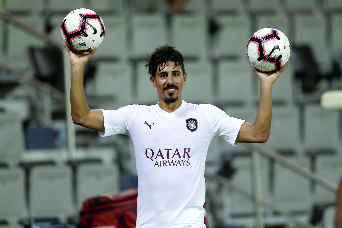 Bounedjah celebrates after the 10-1 win yesterday.