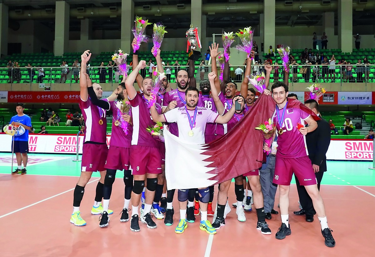 Champion Qatari players celebrate after defeating Iran in the final of the AVC Cup Tournament in Taipei, Chinese Taipei yesterday. 