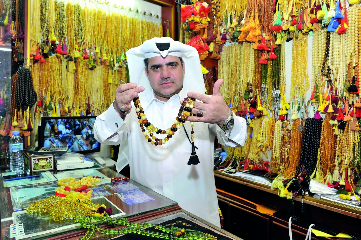 Mahmood Rahim Al Vazehan, the owner of Majic Antique, one of the most prominent shops which sells different types of prayer beads at the Souq Waqif. (Photo: Salim Matramkot / The Peninsula)