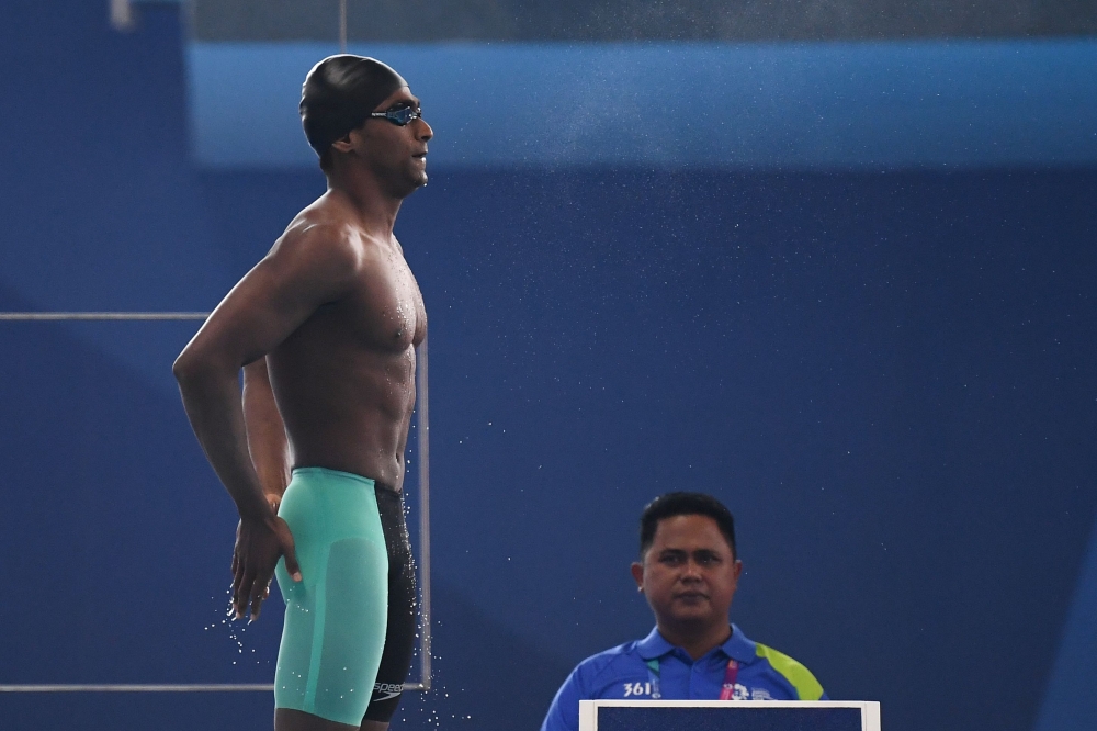 India's Sajan Prakash prepares to compete in a heat of the men’s 100m butterfly swimming event during the 2018 Asian Games in Jakarta on August 22, 2018. AFP/Jewel Samad 