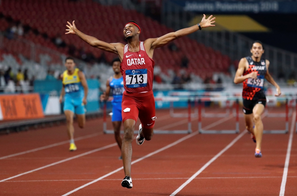 Abderrahman Samba of Qatar celebrates winning the race REUTERS/Darren Whiteside
