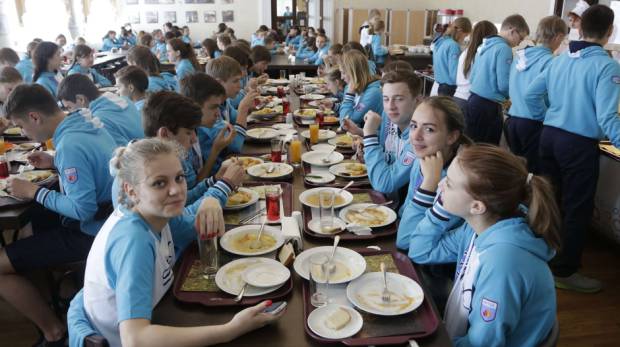 Teenagers have lunch at the Artek international children centre in Gurzuf, some 15 kms outside Yalta AFP