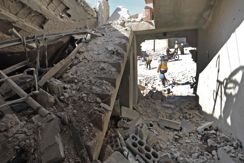 The destruction caused by reported govenrment forces' bombings in the town of Al Habit on the southern edges of the rebel-held Idlib province on September 10, 2018. / AFP / OMAR HAJ KADOUR