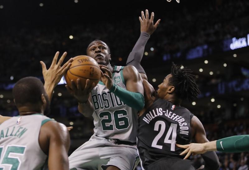 Boston Celtics guard Jabari Bird (26) drives to the basket against Brooklyn Nets forward Rondae Hollis-Jefferson (24) in the second quarter at TD Garden, Apr 11, 2018 Credit: David Butler II-USA TODAY Sports