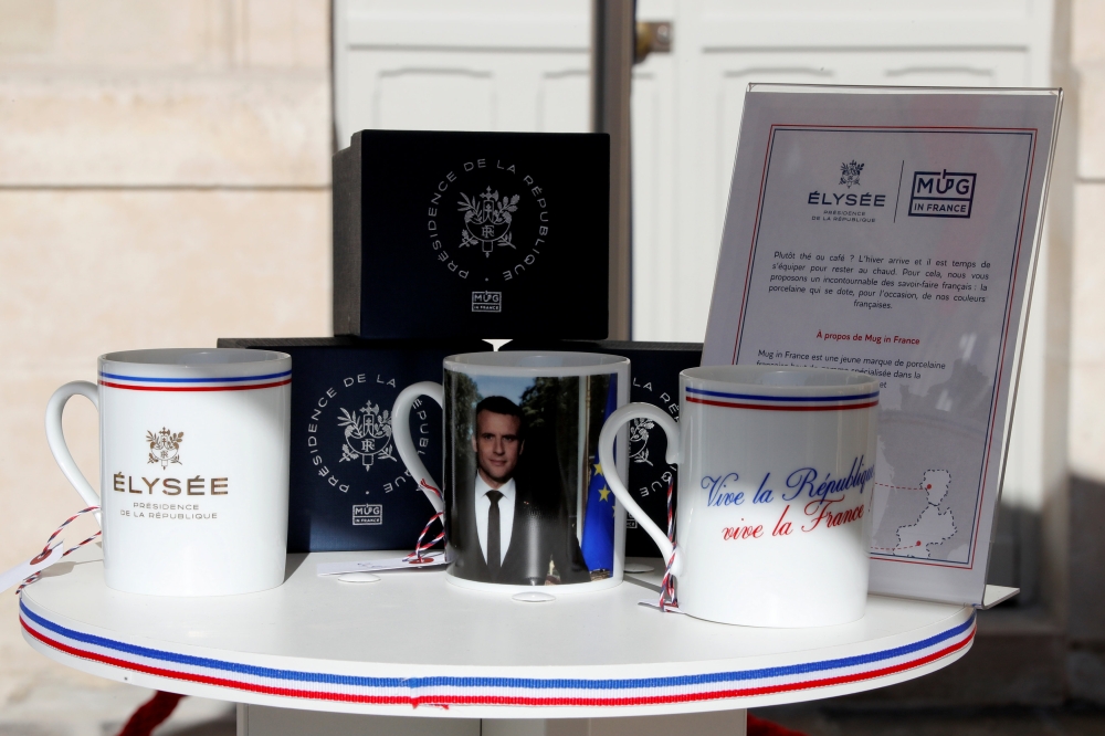 Souvenirs bearing the Elysee Palace logo to launch the presidential brand named ''Elysee Presidence de la Republique'' is seen in the courtyard of the Elysee Palace as part of the European Heritage Days event in Paris, France September 15, 2018. Reuters/G