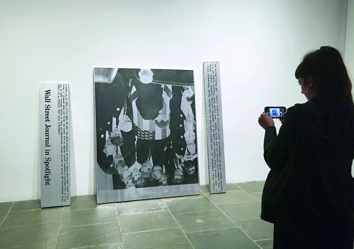 A woman takes a photo of Untitled(Vince Foster 1994) by Cady Noland during an exhibition at the Met Breuer, Metropolitan Museum of Art titled 