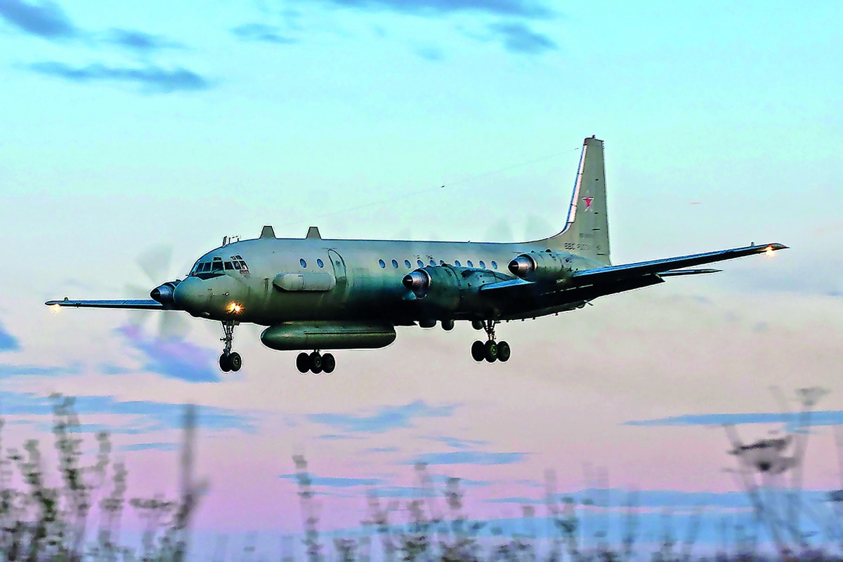 A photo taken on July 23, 2006 shows an Russian IL-20M (Ilyushin 20m) plane landing at an unknown location.  AFP / Nikita Shchyukin
 