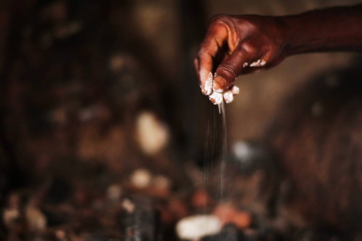 Hand of juju priest David Ubebe during a juju ceremony in his shrine in Benin, Nigeria, July 1, 2018. Thomson Reuters Foundation/Kagho Idhebor 