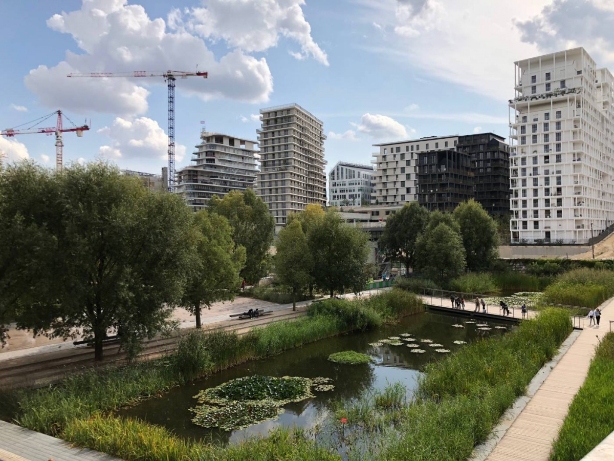 A view of a plant-filled pond in the Martin Luther King park of the Clichy-Batignolles “eco-neighbourhood” in Paris, France, August 31, 2018. Thomson Reuters Foundation/Zoe Tabary