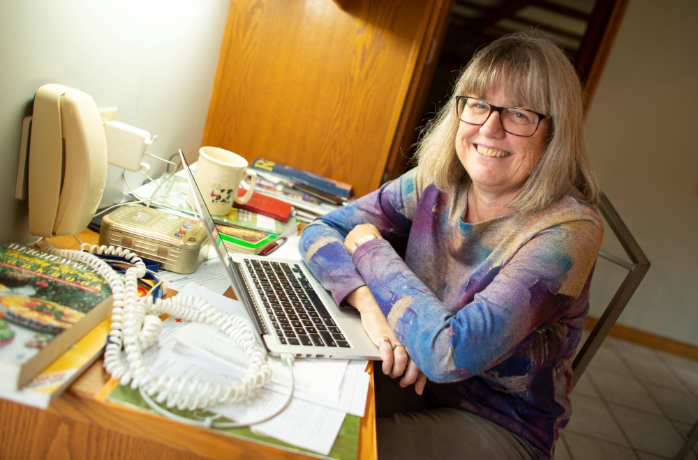 Donna Strickland, an associate professor at the University of Waterloo, at the desk where she watched the press conference this morning after winning the Nobel Prize for Physics at her home in Waterloo, Ontario, Canada October 2, 2018. Reuters/Peter Power