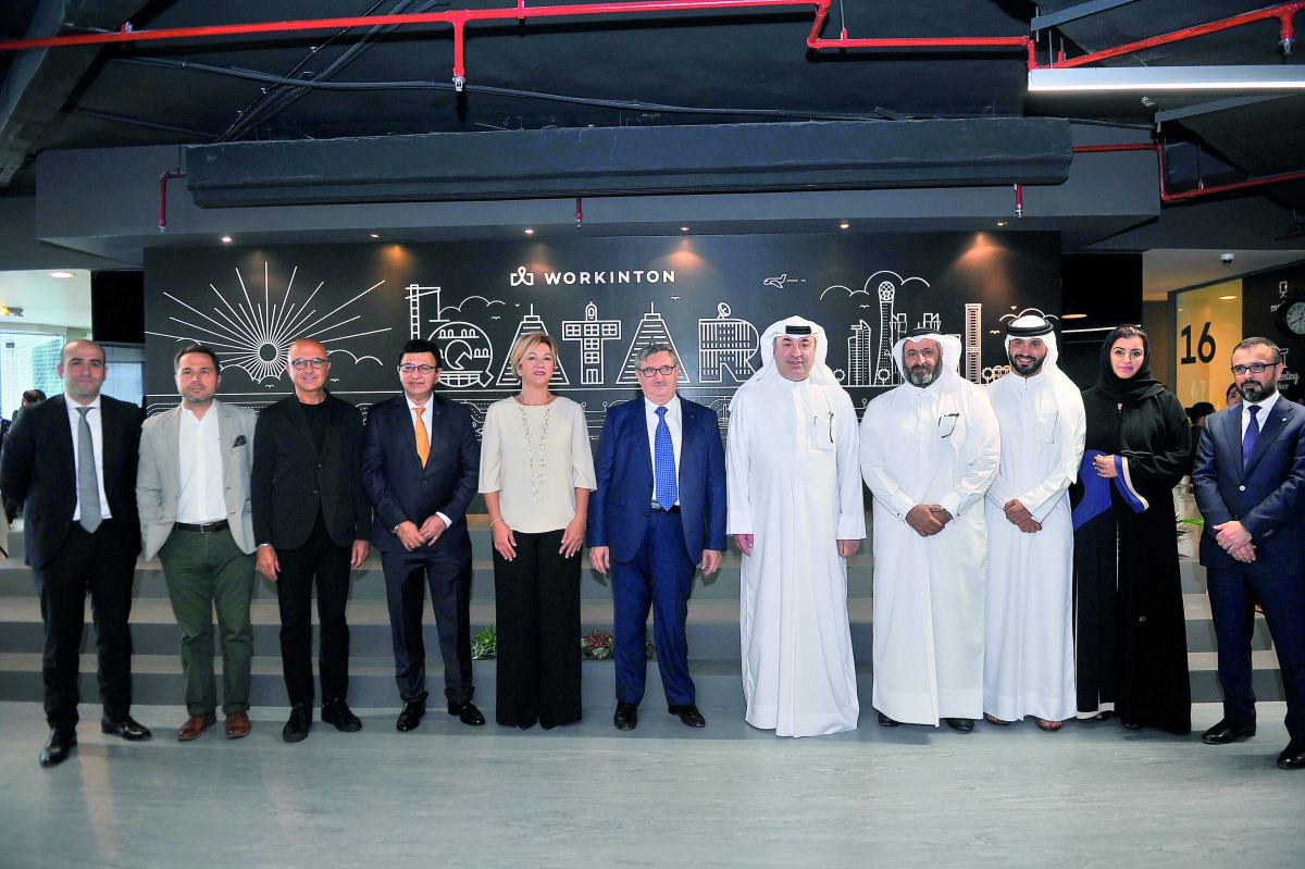 Fikret Ozer (centre), Turkey’s Ambassador to Qatar;  Omar Hussain Alfardan (fifth right), President & CEO of Alfardan Group; Pinar Massena (fifth left), CEO of Workinton;  and other officials during the launch of Workinton Doha at Alfardan Center yesterda