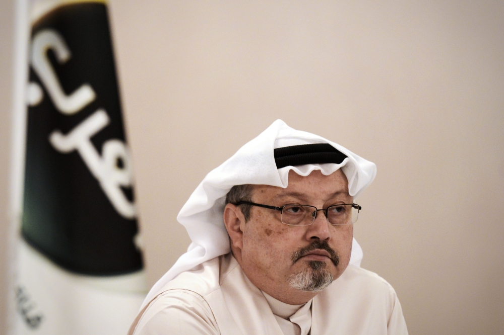 In this file photo taken on December 15, 2014, general manager of Alarab TV, Jamal Khashoggi, looks on during a press conference in the Bahraini capital Manama. AFP / Mohammed Al-Shaikh 