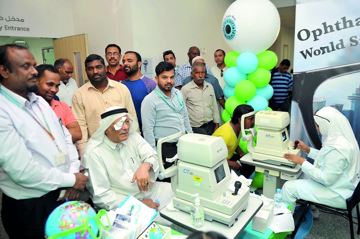 People undergoing eye tests during an awareness campaign held by Hamad Medical Corporation to mark the World Sight Day, yesterday. 
Pic by Abdul Basit / The Peninsula