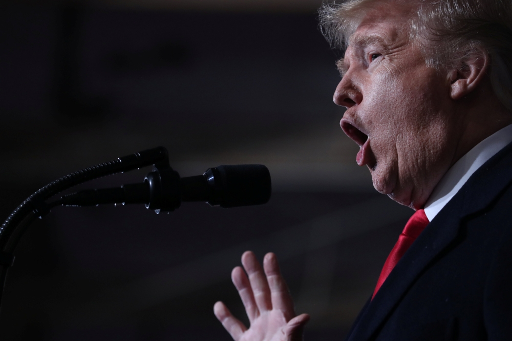 US President Donald Trump rallies with supporters at the Warren County Fairgrounds in Lebanon, Ohio, U.S., October 12, 2018. (REUTERS/Jonathan Ernst)