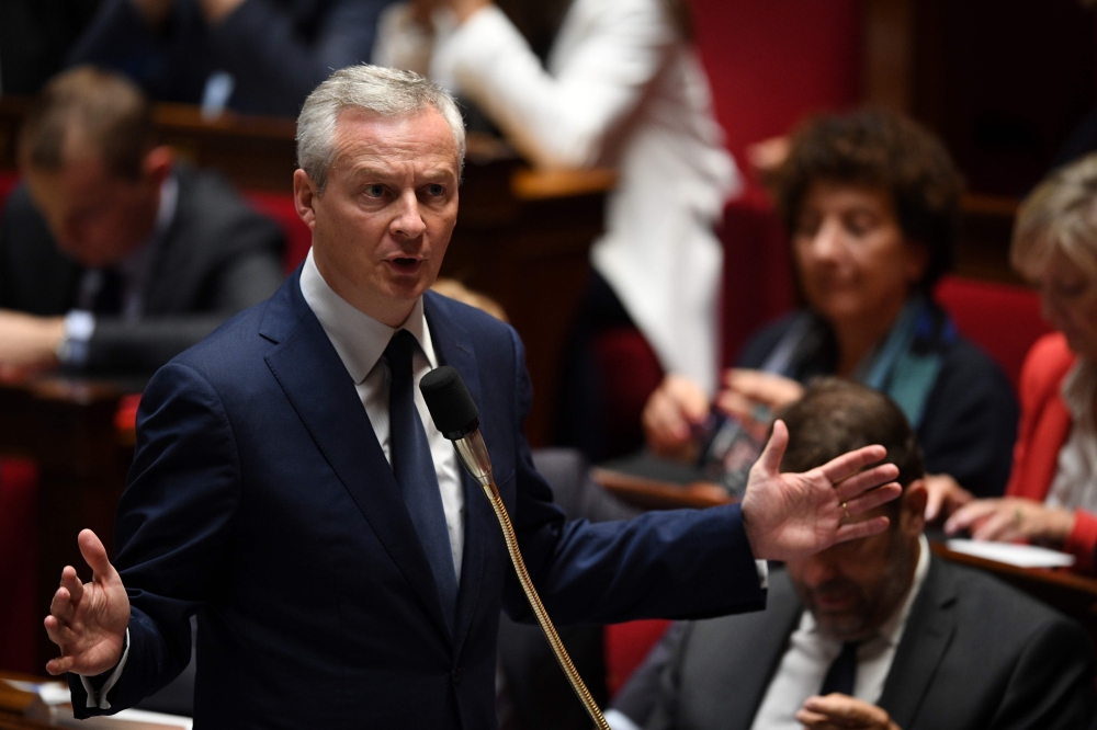 French Economy Minister Bruno Le Maire speaks during a session of questions to the government at the French National Assembly in Paris on October 17, 2018. / AFP / Eric FEFERBERG