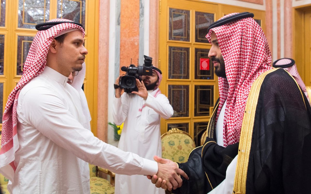 Salah Khashoggi shakes hands with Crown Prince Mohammed bin Salman after being 'invited' to receive condolences (Photo: Saudi Press Agency) 
