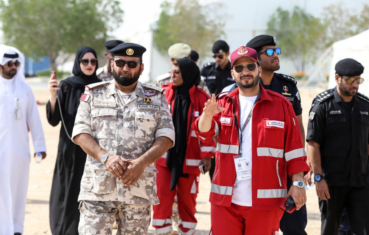 Dr Hamad Al Fayyad, Head of the DMC-8, with defence officials while visiting the Disaster Management Camp being organised by Qatar Red Crescent Society. Pic: Salim Matramkot/The Peninsula
