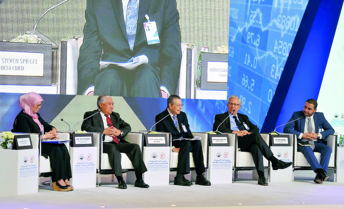 FROM LEFT: Amel Azzouz, Prof Din Syamsuddin, Prof Steve Spiegel, Ambassador Charles Ries and Adel Hamaizia, during the opening plenary session of the conference, yesterday. Pic: Abdul Basit / The Peninsula