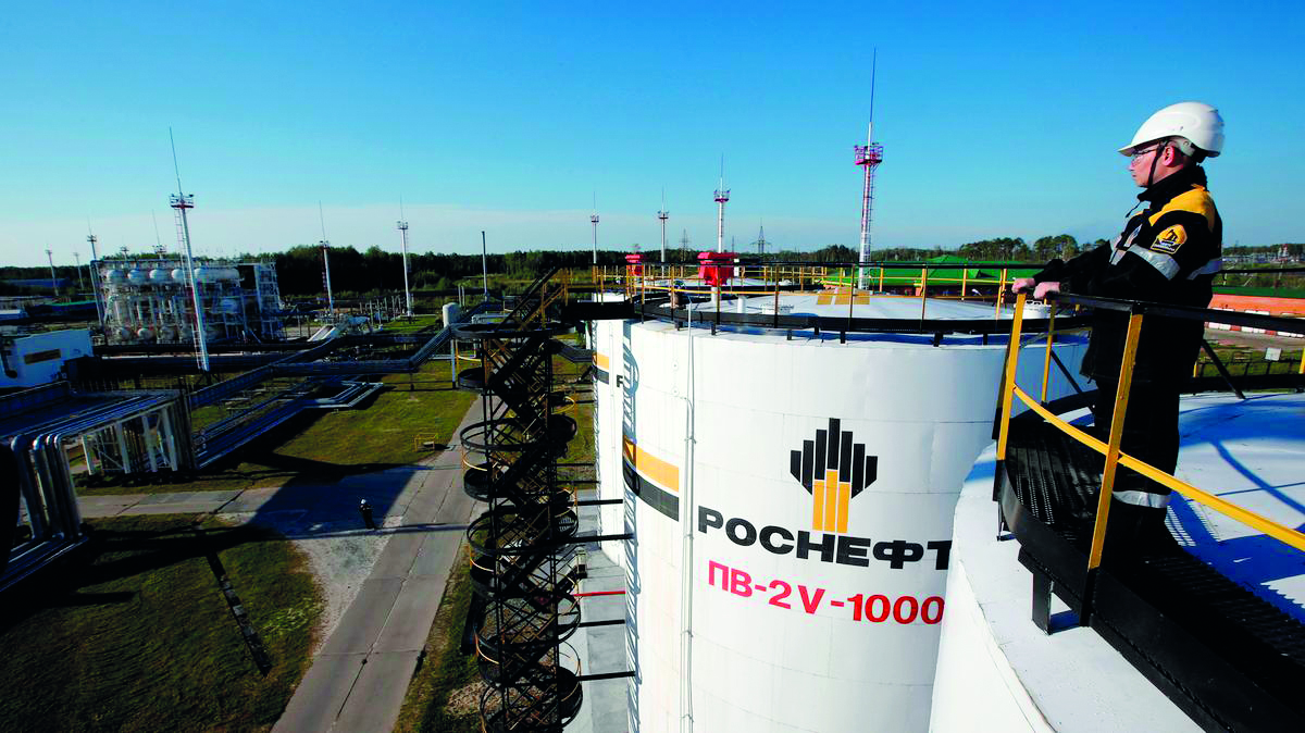 A worker is seen at the central processing facility of the Rosneft owned Priobskoye oil field outside the West Siberian city of Nefteyugansk.