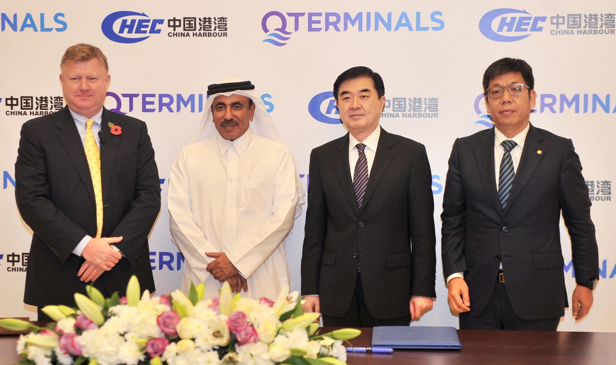 H E Jassim bin Saif Al Sulaiti (second left), Minister of Transport and Communications; Neville Bissett (left), CEO of QTerminals; Li Chen (second right), Ambassador of the People’s Republic of China to Qatar; and Tang Qiaoliang, Director of China Harbour