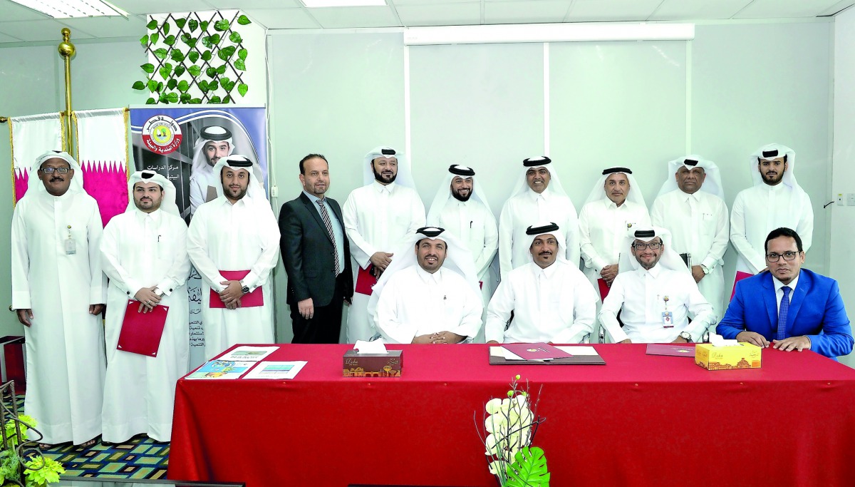 Omar Salem Al Nuaimi (standing fourth from right), Director of Wildlife and Protection Department at the Ministry of Municipality and Environment, with the team in charge of protecting the turtles for 2018 season  after an awarding ceremony held at the Mi