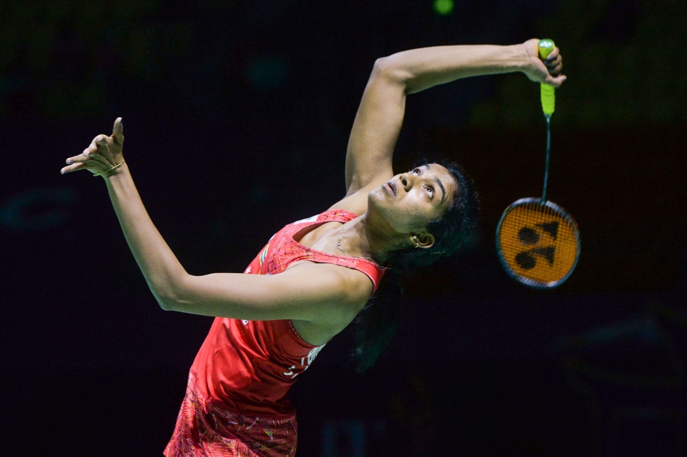 Sindhu Pusarla of India hits a return against He Bingjiao of China during their women's singles quarter-final match at the China Open 2018 Badminton Championships in Fuzhou, in China's eastern Fujian province on November 9, 2018. China OUT / AFP / STR