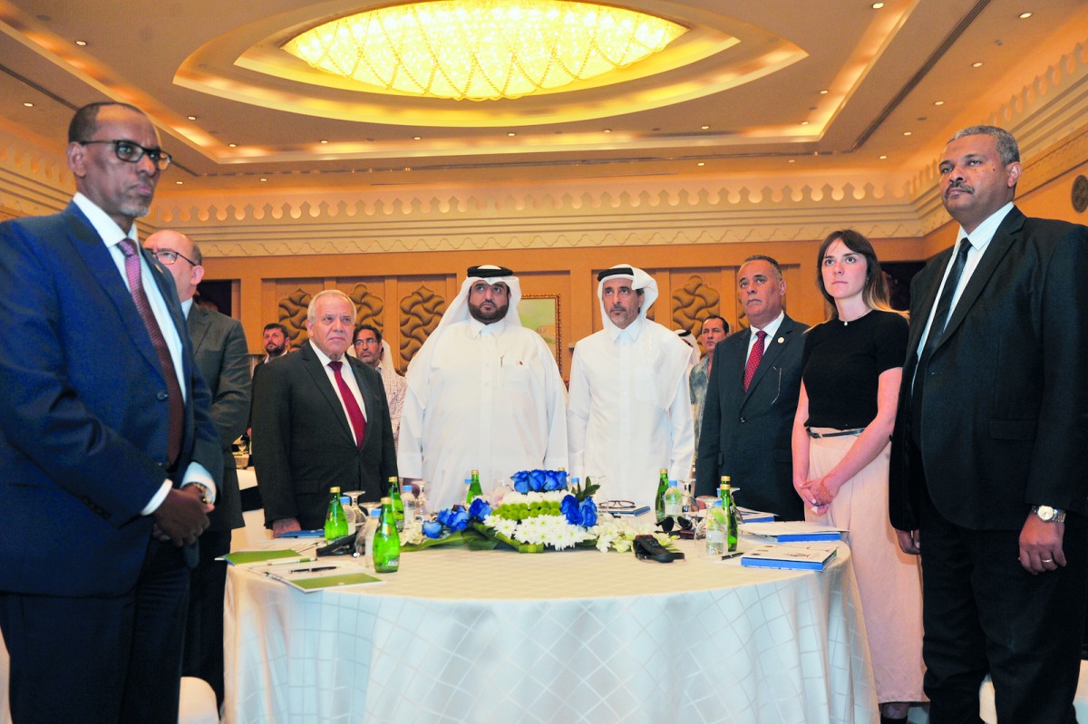 Minister of Culture and Sports H E Salah bin Ghanem Al Ali (fourth right), Abdulrahman bin Mohammed Al Hajri, Director of the Youth Affairs Department, (fourth left), Abdulmunem Al Shaari, Representative of League of Arab States and Andrea Ugrinoska, Repr