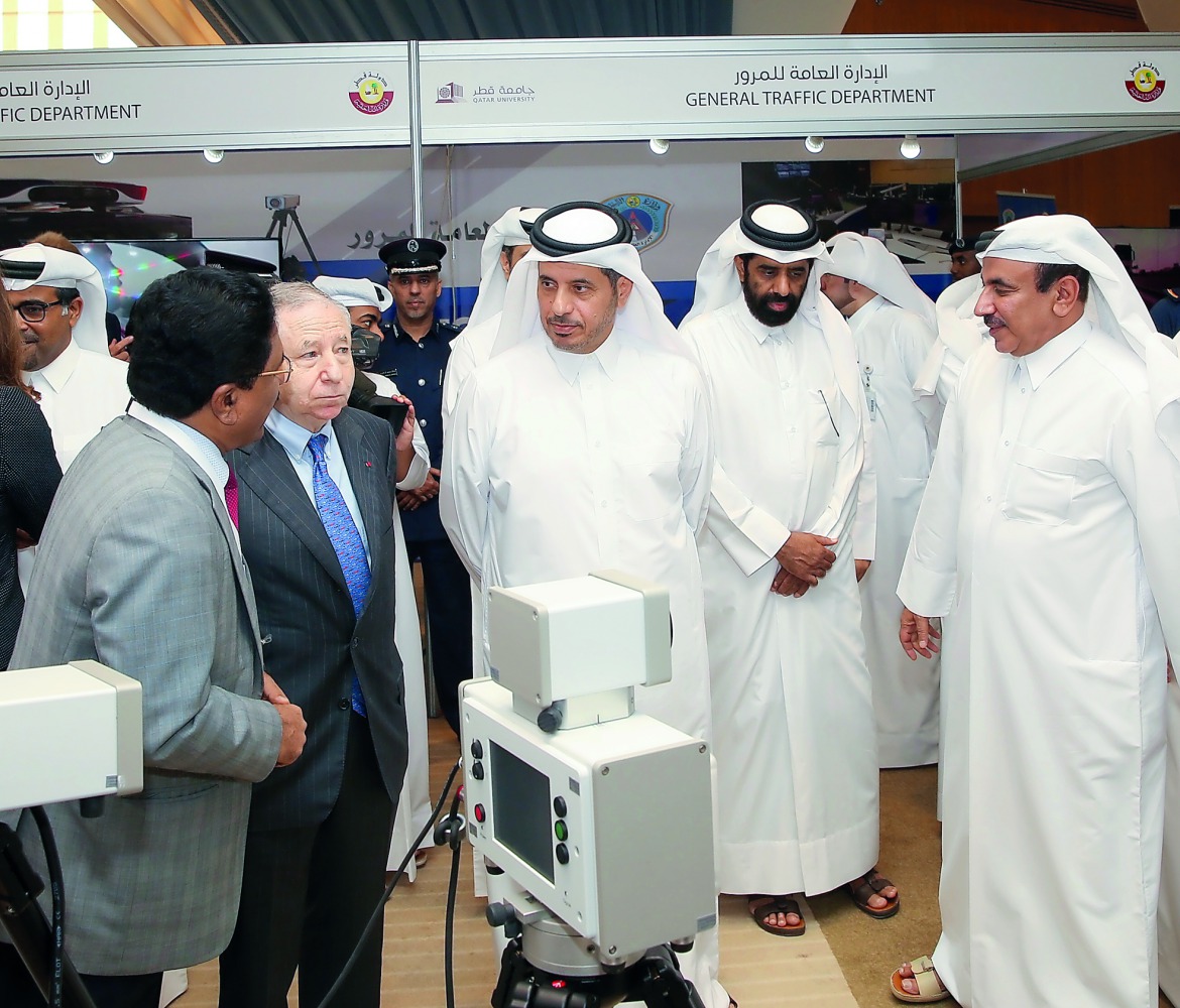 Prime Minister and Interior Minister H E Sheikh Abdullah bin Nasser bin Khalifa Al Thani at the exhibition of the International Traffic Safety Conference yesterday. Minister of Transport and Communications 
H E Jassim bin Saif Al Sulaiti (right), UN Secr