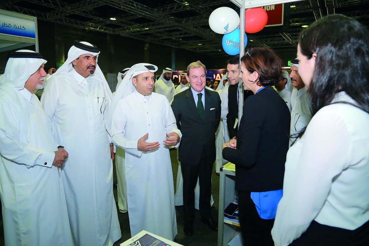 Minister of Education and Higher Education H E Dr Mohammed Abdul Wahed Ali Al Hammadi (third left) and Qatar Chamber Vice-Chairman Mohamed bin Ahmed bin Towar Al Kuwari along with other dignitaries during their visit yesterday to the University Expo Qatar