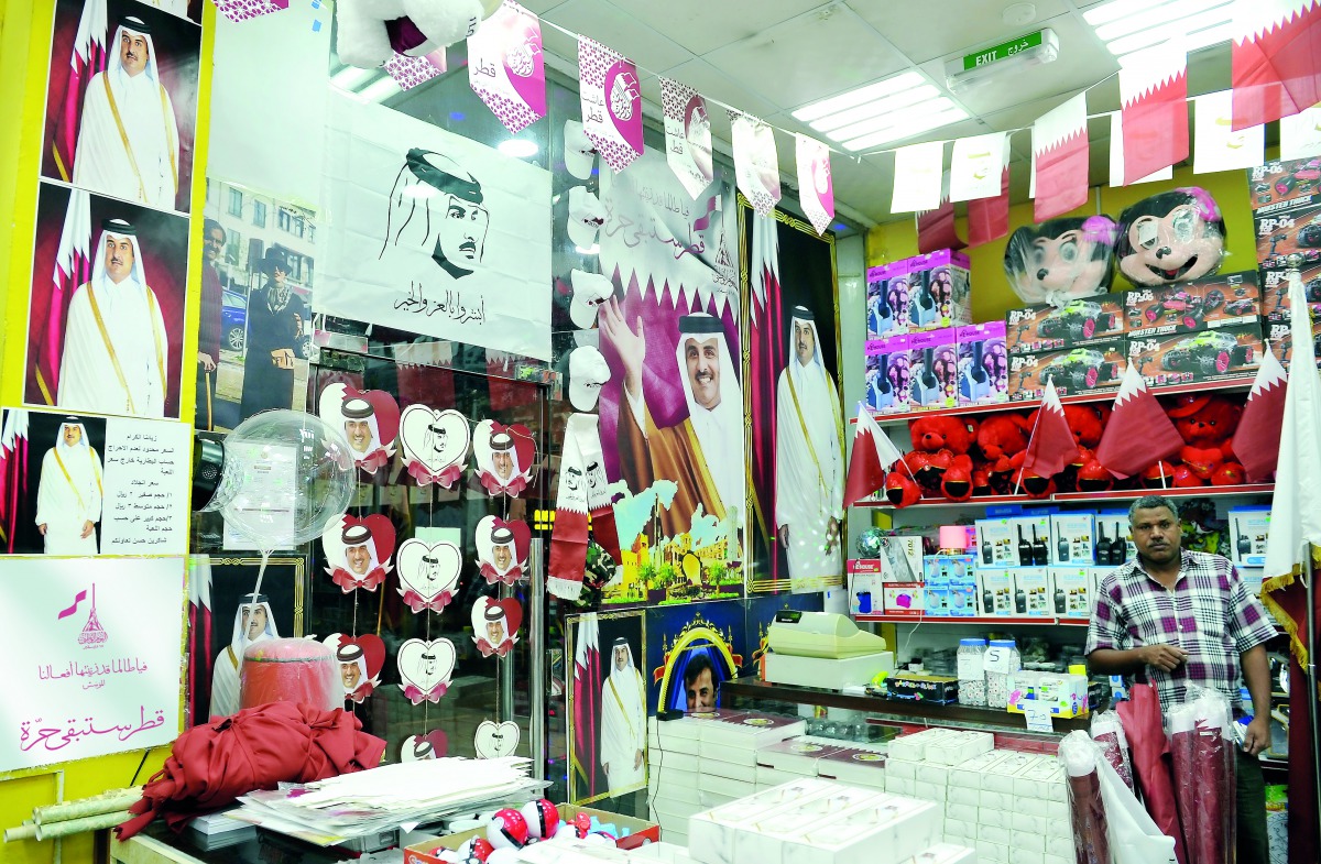 A shop in Old Airport area displaying various Qatar National Day items, yesterday. Pic: Salim Matramkot / The Peninsula