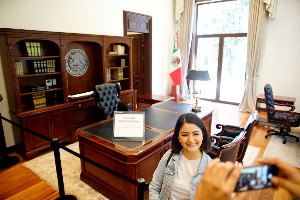 Student Barbara Alvarez poses for a photo at the Presidential Office of Los Pinos Presidential residence, turned into a museum by order of Mexico's new President Andres Manuel Lopez Obrador, in Mexico City, Mexico December 1, 2018. REUTERS/Alexandre Meneg