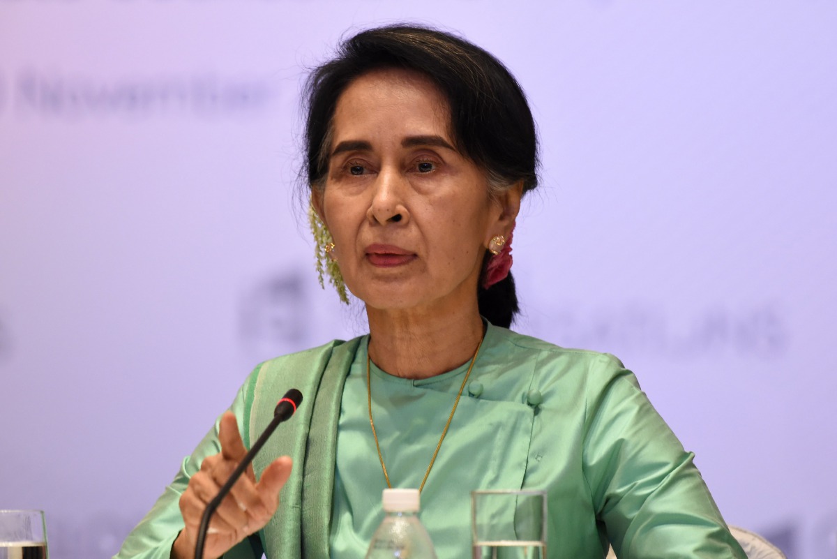 Myanmar State Counsellor Aung San Suu Kyi speaking at the International Enterprise Global Conversation on November 30, 2016 in Singapore. AFP/Roslan Rahman