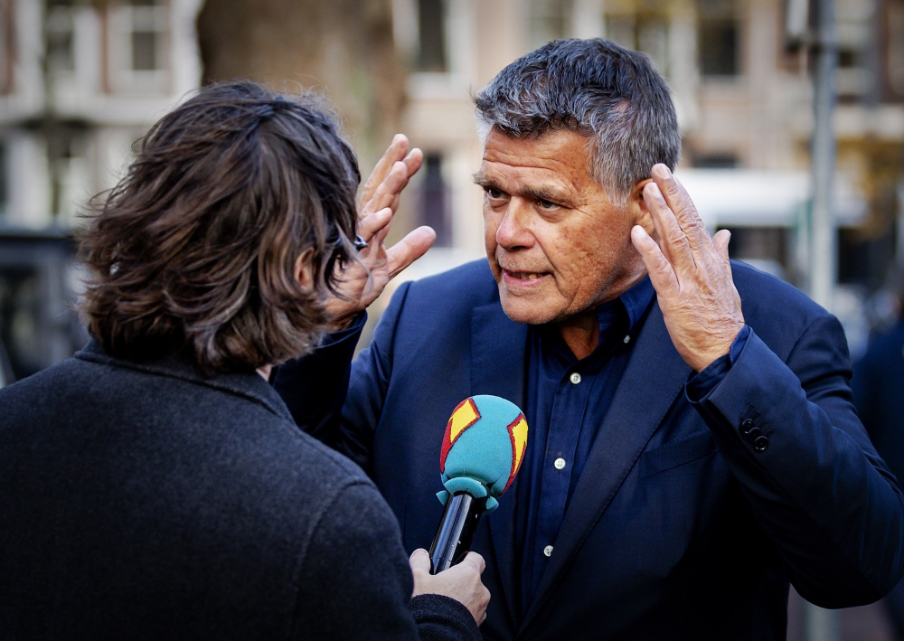 Emile Ratelband, 69, answers journalists' questions on December 3, 2018 in Amsterdam, prior to attend the court's decision regarding his legal bid to slash 20 years off his age.  AFP / ANP / Robin van Lonkhuijsen