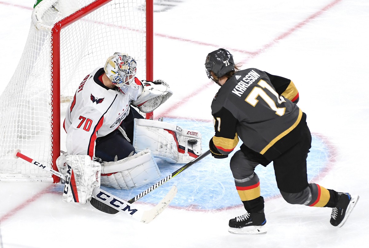 Washington Capitals goaltender Braden Holtby (70) makes a third period save against Vegas Golden Knights center William Karlsson (71) at T-Mobile Arena. Credit: Stephen R. Sylvanie-USA TODAY Sports
